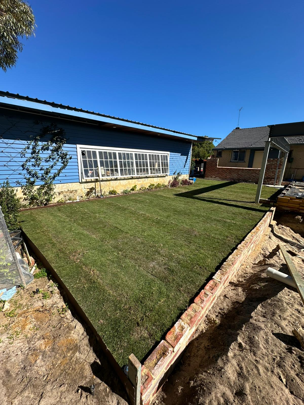 Freshly laid roll-on turf, Perth backyard